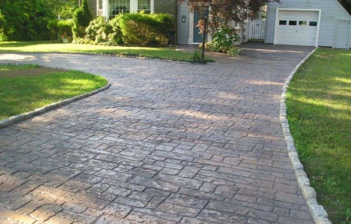Decorative stamped concrete driveway installation